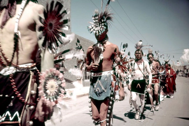 Members of a tribe participate in the parade.