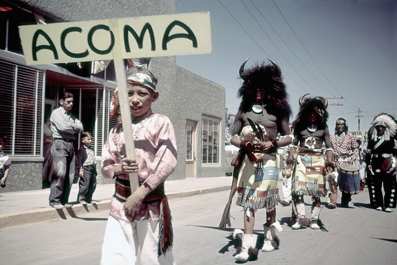 Members of the Acoma tribe participate in the parade.