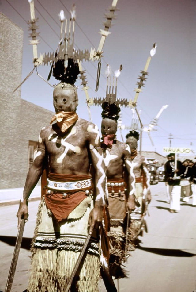 Members of the Mescalero Apache tribe participate in the parade.