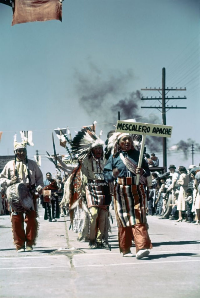 Members of the Mescalero Apache tribe participate in the parade.