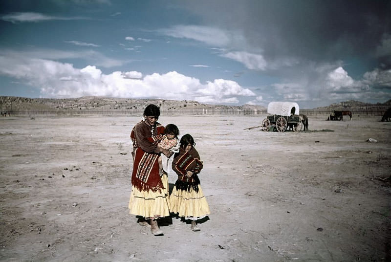 A Native American woman and her two children at the campgrounds.