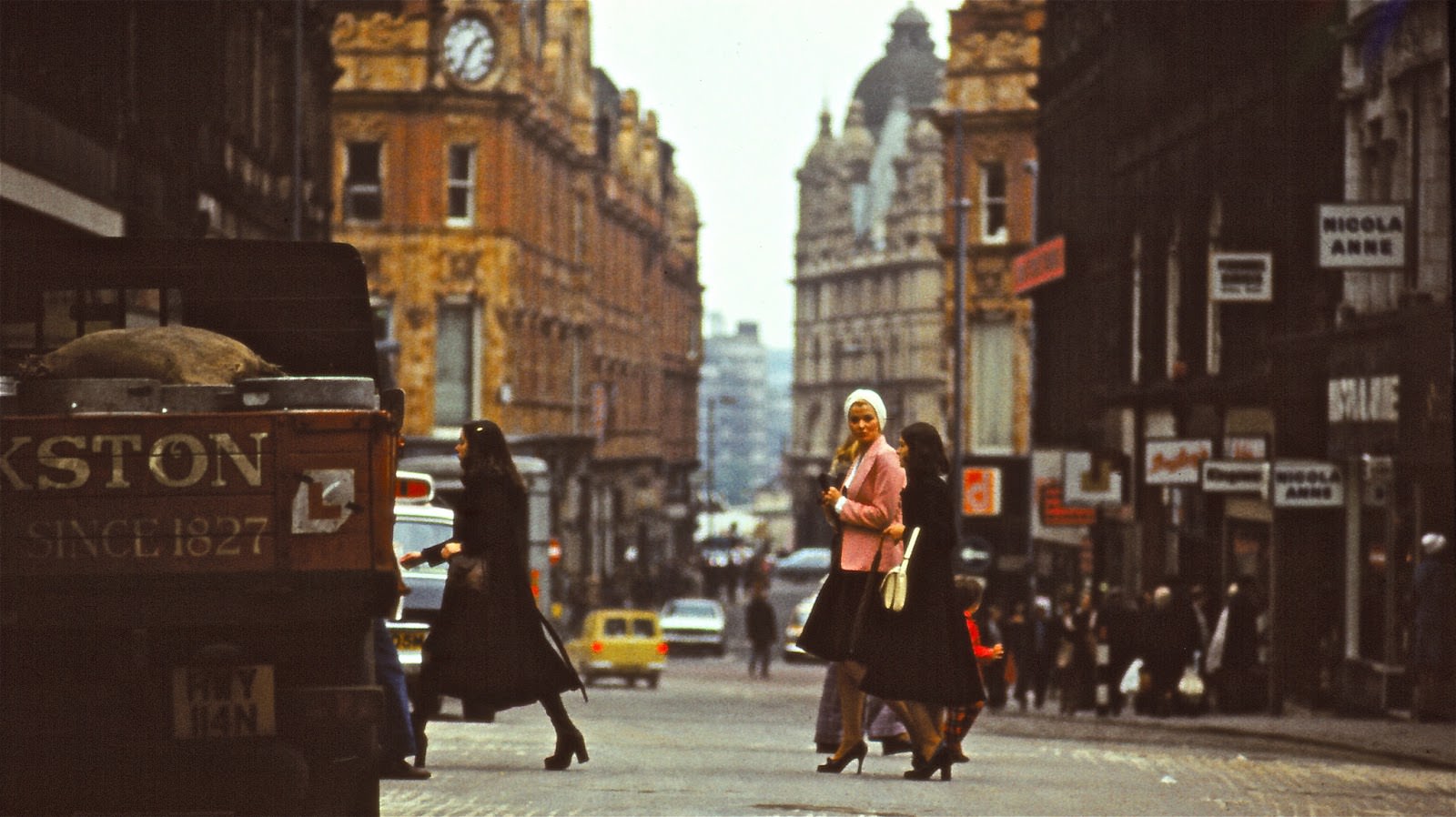 Shoppers crossing Lands Lane.