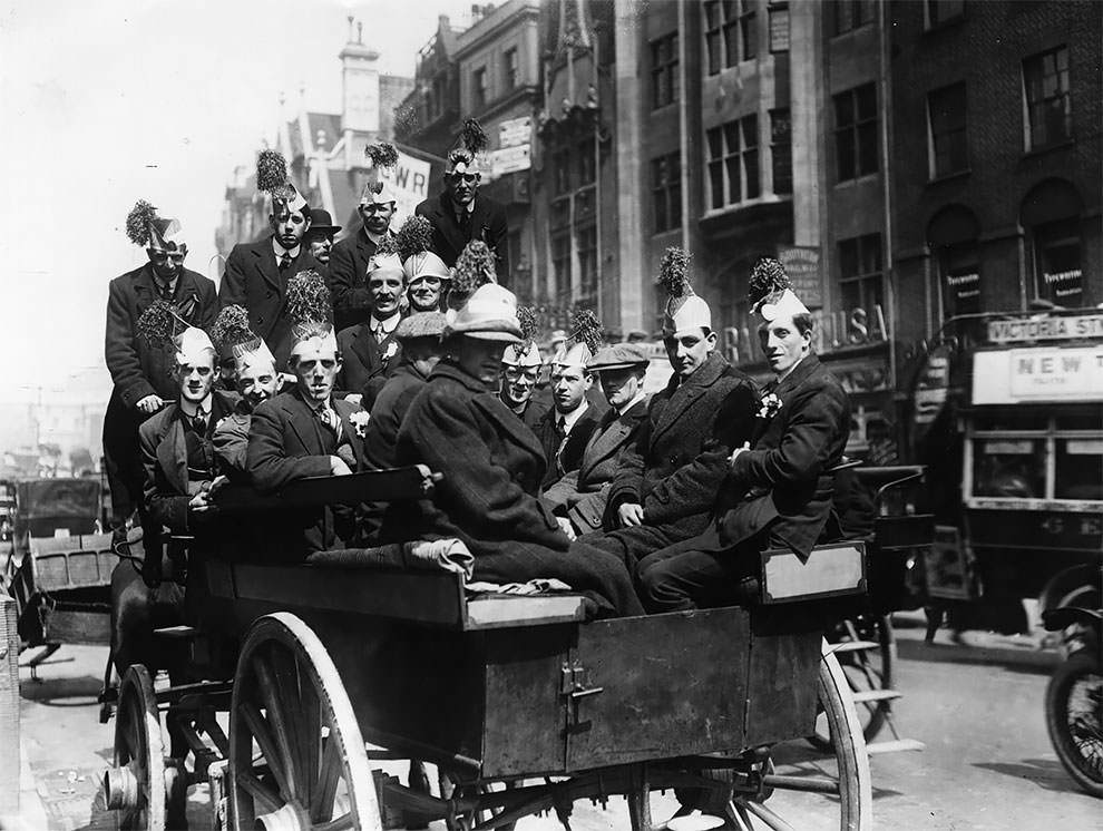 A group of Liverpool supporters on their way to Crystal Palace in the back of a horse-drawn bus for the FA Cup Final against Burnley, 1914