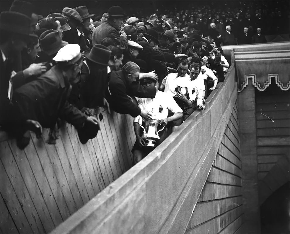 Supporters congratulating members of Bolton Wanderers FC at Wembley after their victory over Manchester City in the final of the FA Cup, April 1926