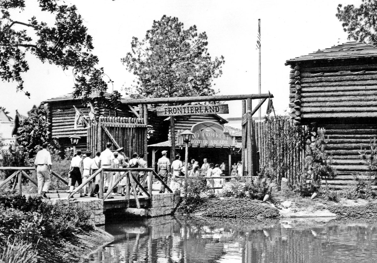 Tourists enter Frontierland, a re-creation of the Old West, in Disneyland, ca. 1955