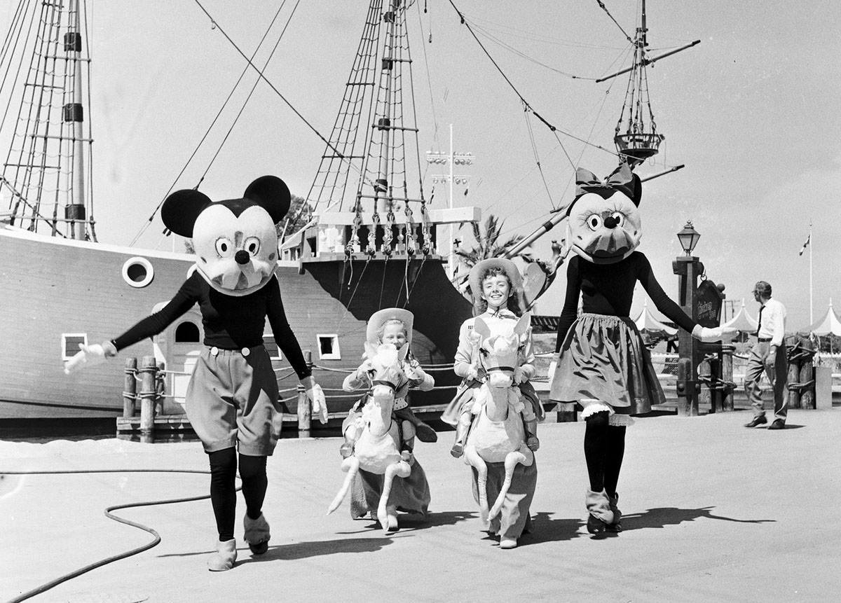 Mickey and Minnie Mouse appear at Disneyland's opening day, on July 17, 1955