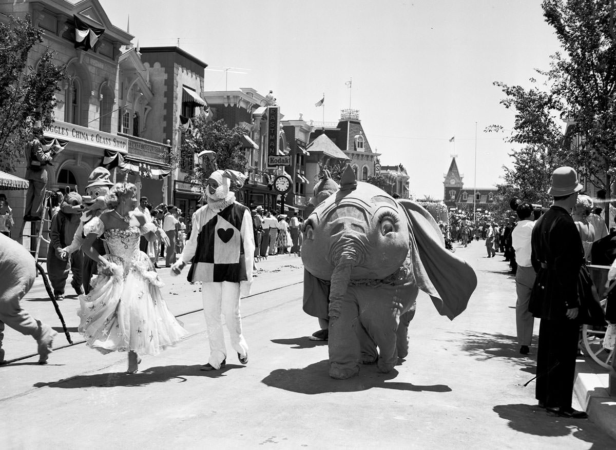 Dumbo and other characters from Disney movies appear in a parade down Main Street, U.S.A., at the Disneyland opening on July 17, 1955