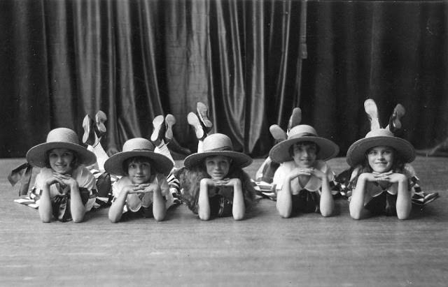 Lovely dancing girls with hats