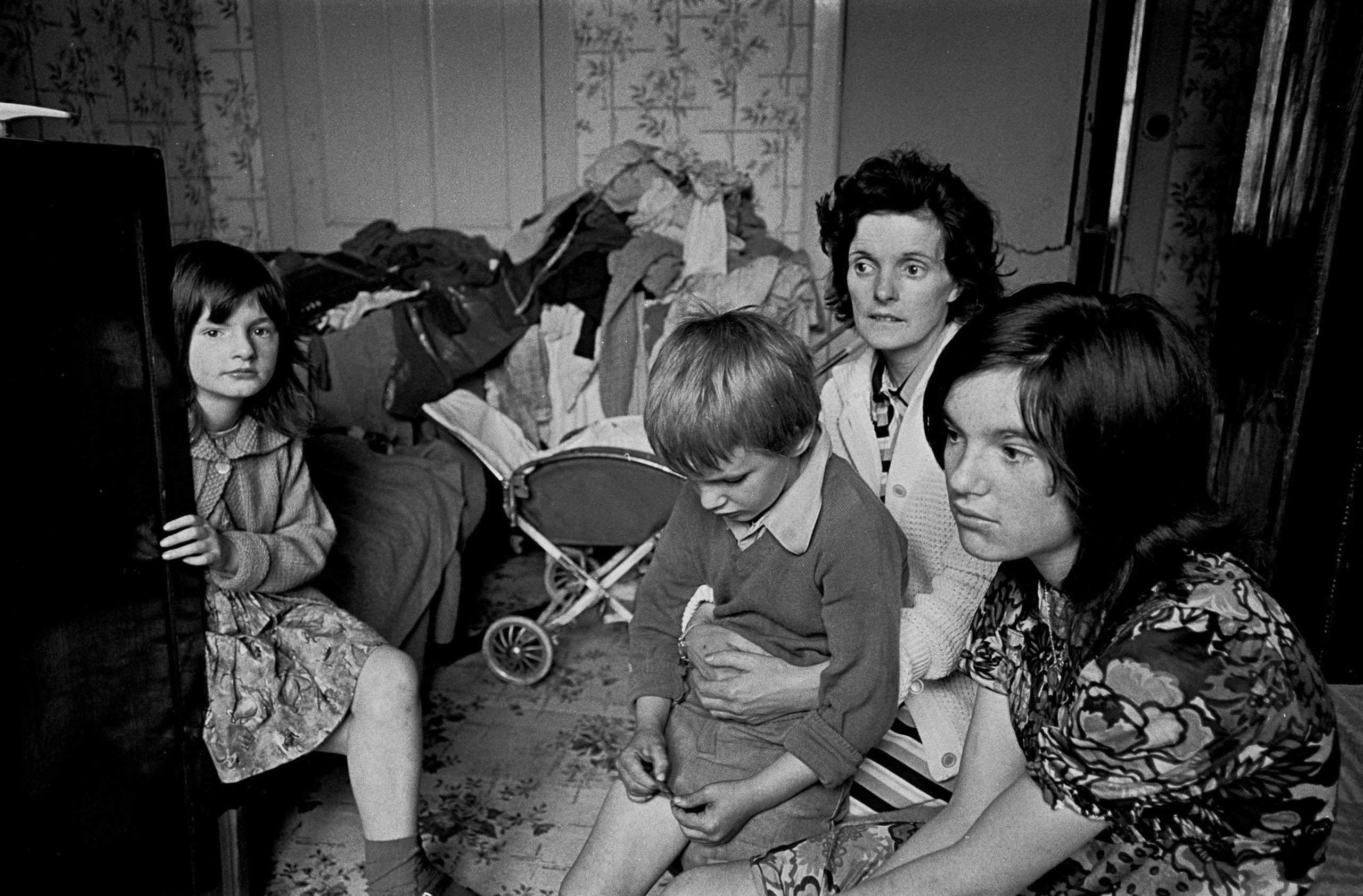 Family living in an overcrowded tenement flat Glasgow 1971
