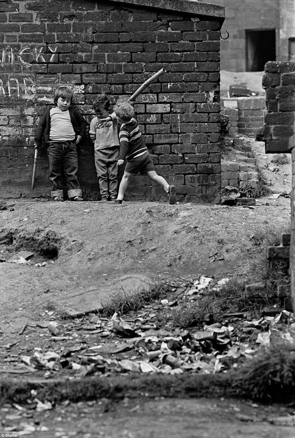 Children playing in a Glasgow tenement courtyard 1971