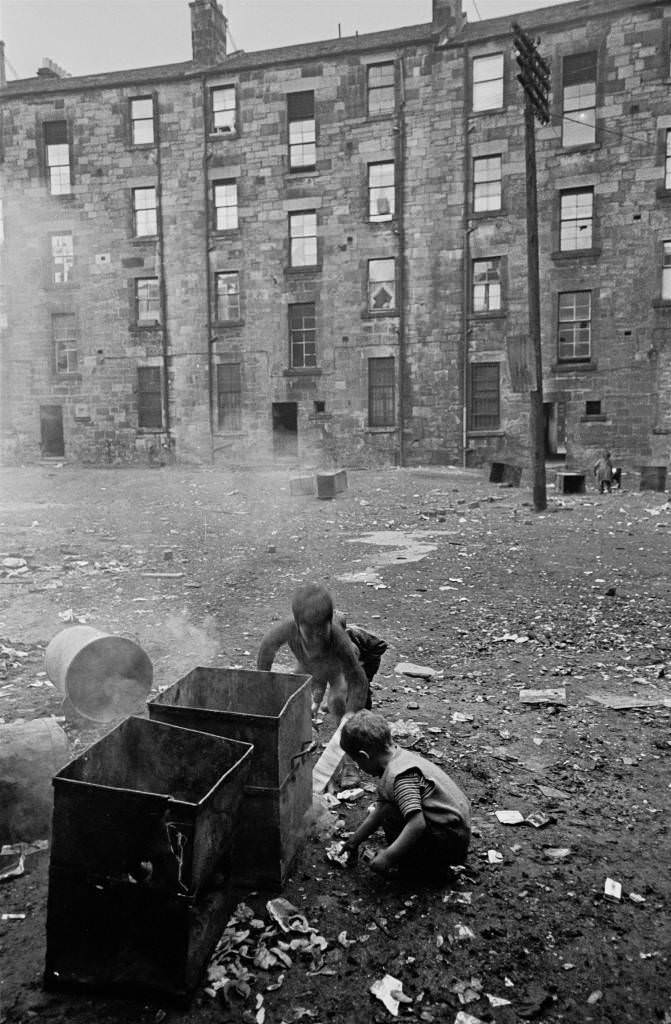 Boys setting fire to waste bins Gorbals 1970