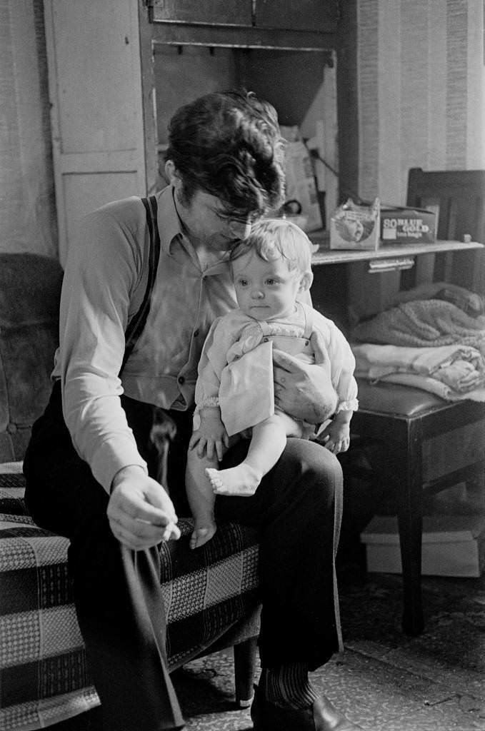 Father and child in a Maryhill tenement 1971