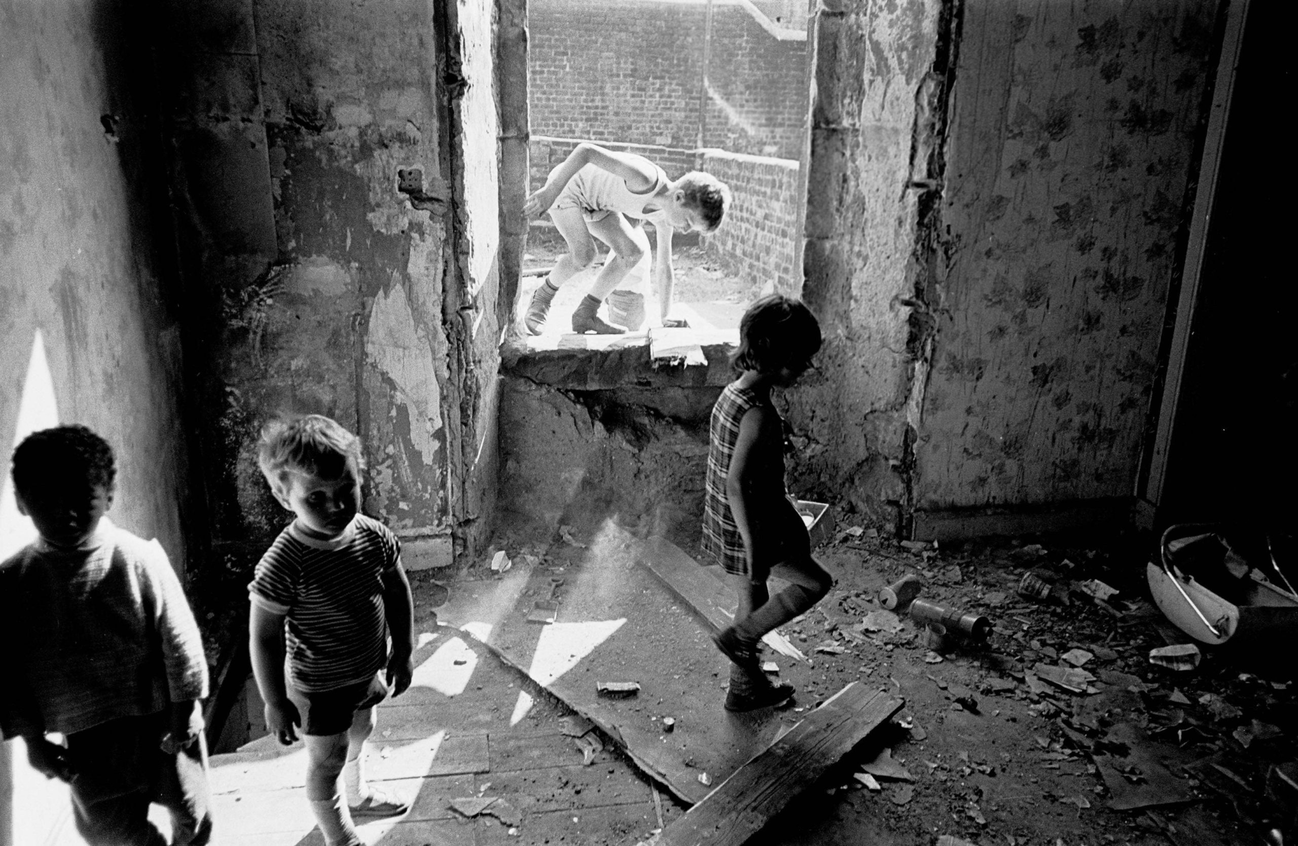 Children playing in a derelict tenement, Glasgow