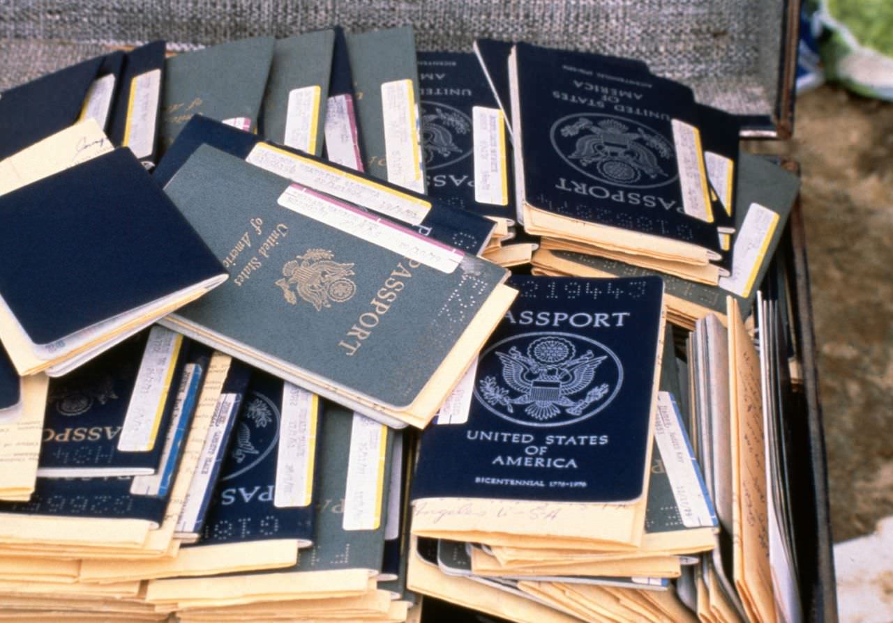Stack of U.S. passports that belonged to members of the Peoples Temple cult, who participated in a mass suicide, Jonestown, Guyana on Nov. 18, 1978.