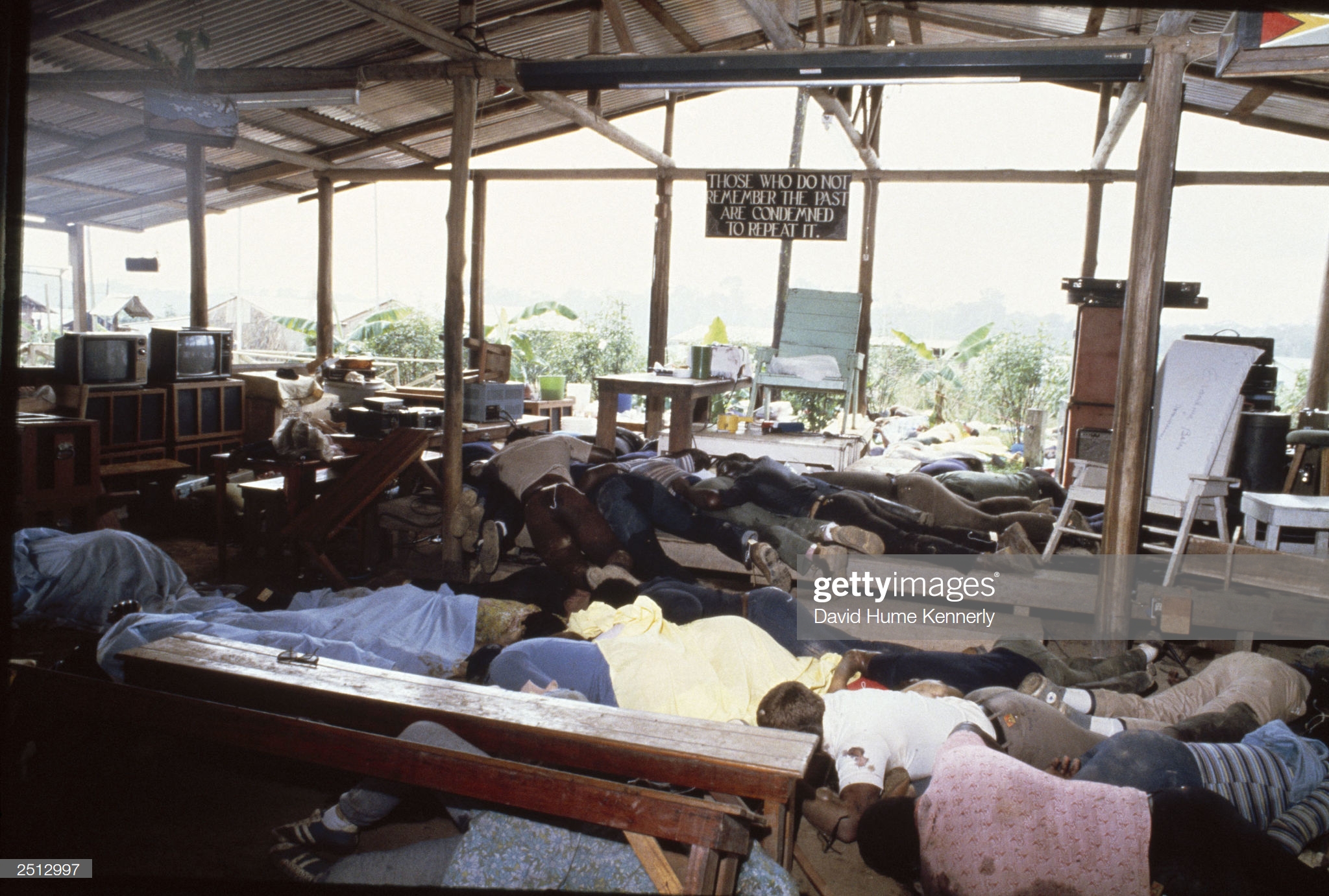 Dead bodies lie in the compound of the People's Temple cult