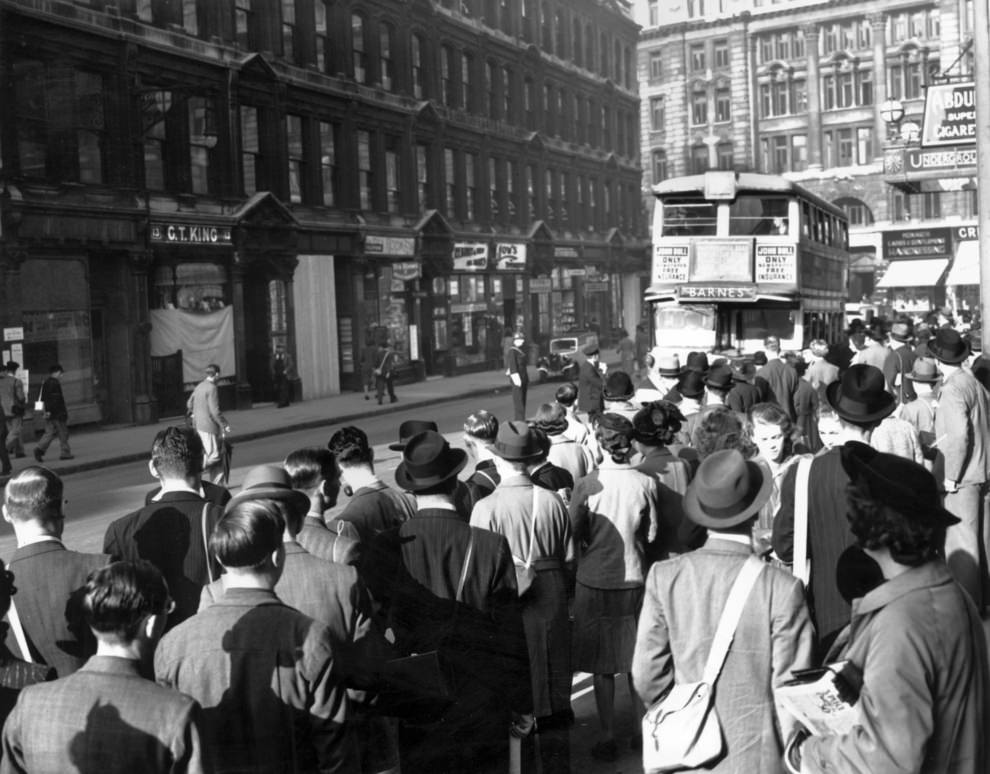 A strike causes huge queues to build up at the bus stops outside Liverpool Street, 1939.