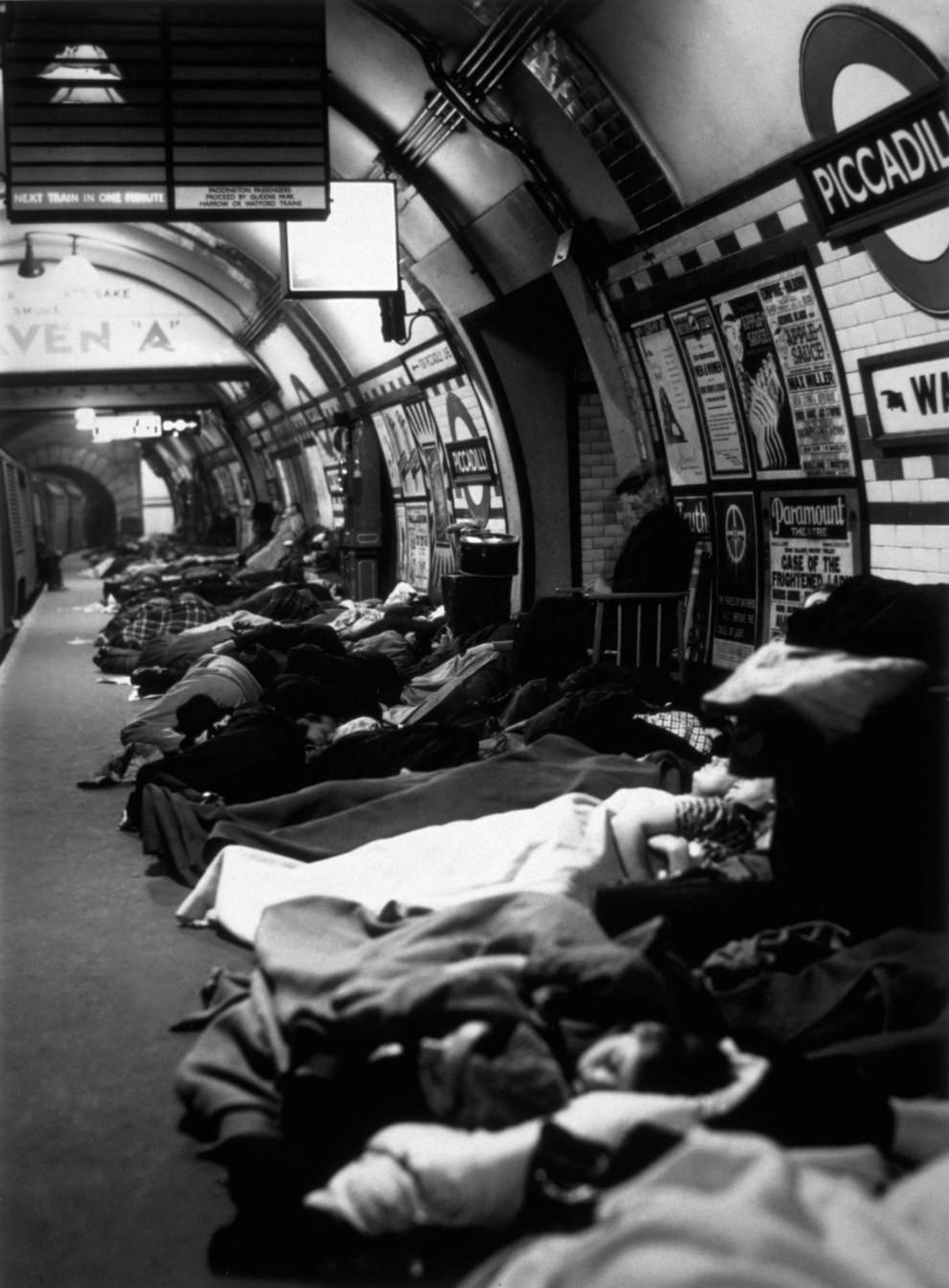 People asleep on the platform at Piccadilly Tube Station, London during an air raid, 1940.