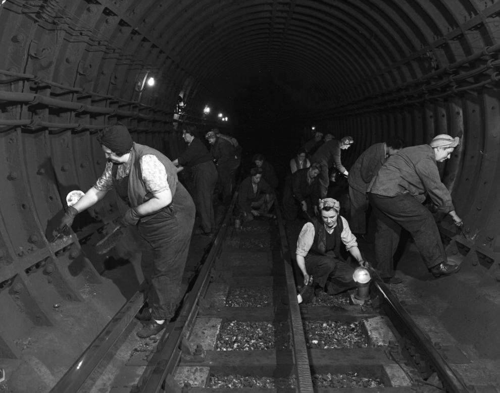 A group of women cleaning one of London’s underground tunnels, 1952.