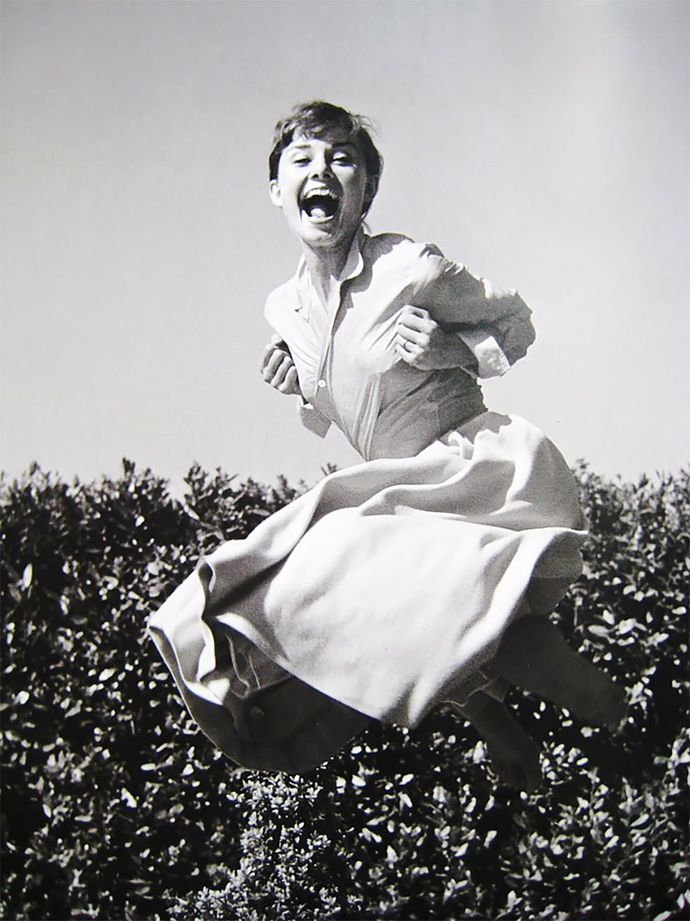 British actress and humanitarian Audrey Hepburn, 1955. Jumpology.