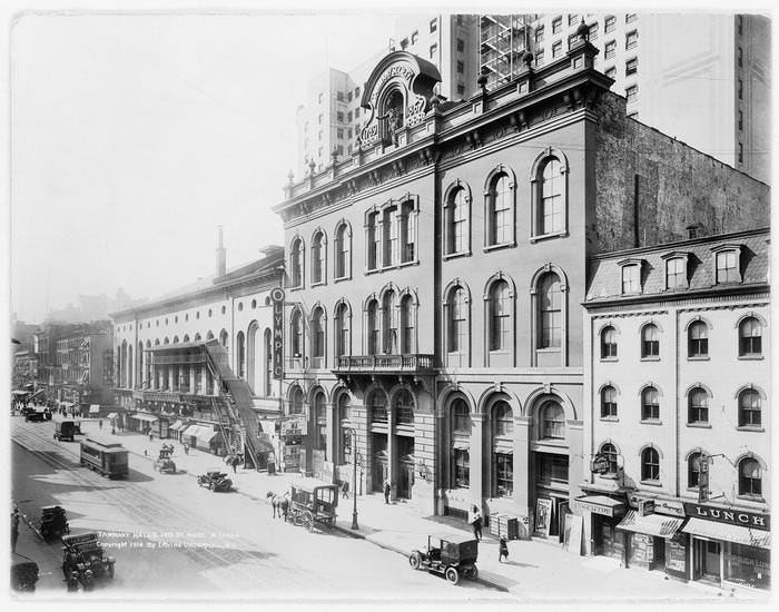 Tammany Hall was the headquarters of the Democratic party for decades. The building on East 14th Street was built in 1830, and was demolished in 1927 to make room for a new tower.