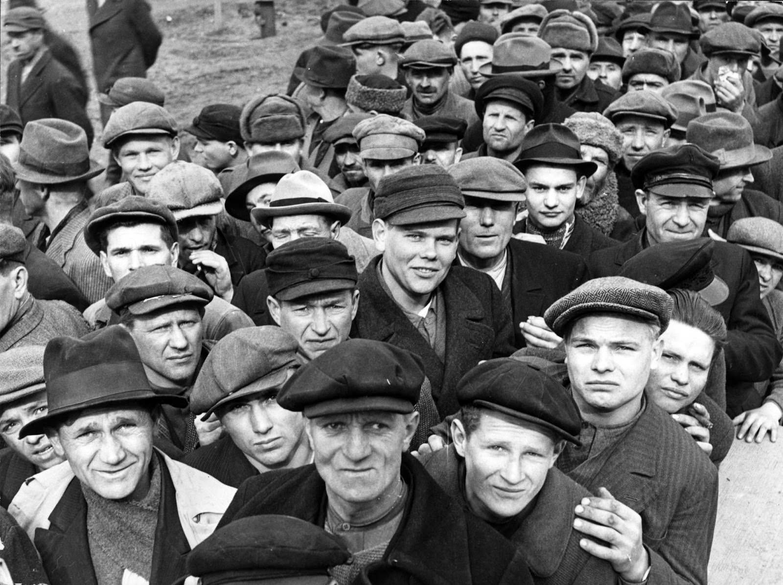 Refugees from across Central Europe queue for food at an Allied Forces refugee camp in Germany, on Mar. 20, 1945.