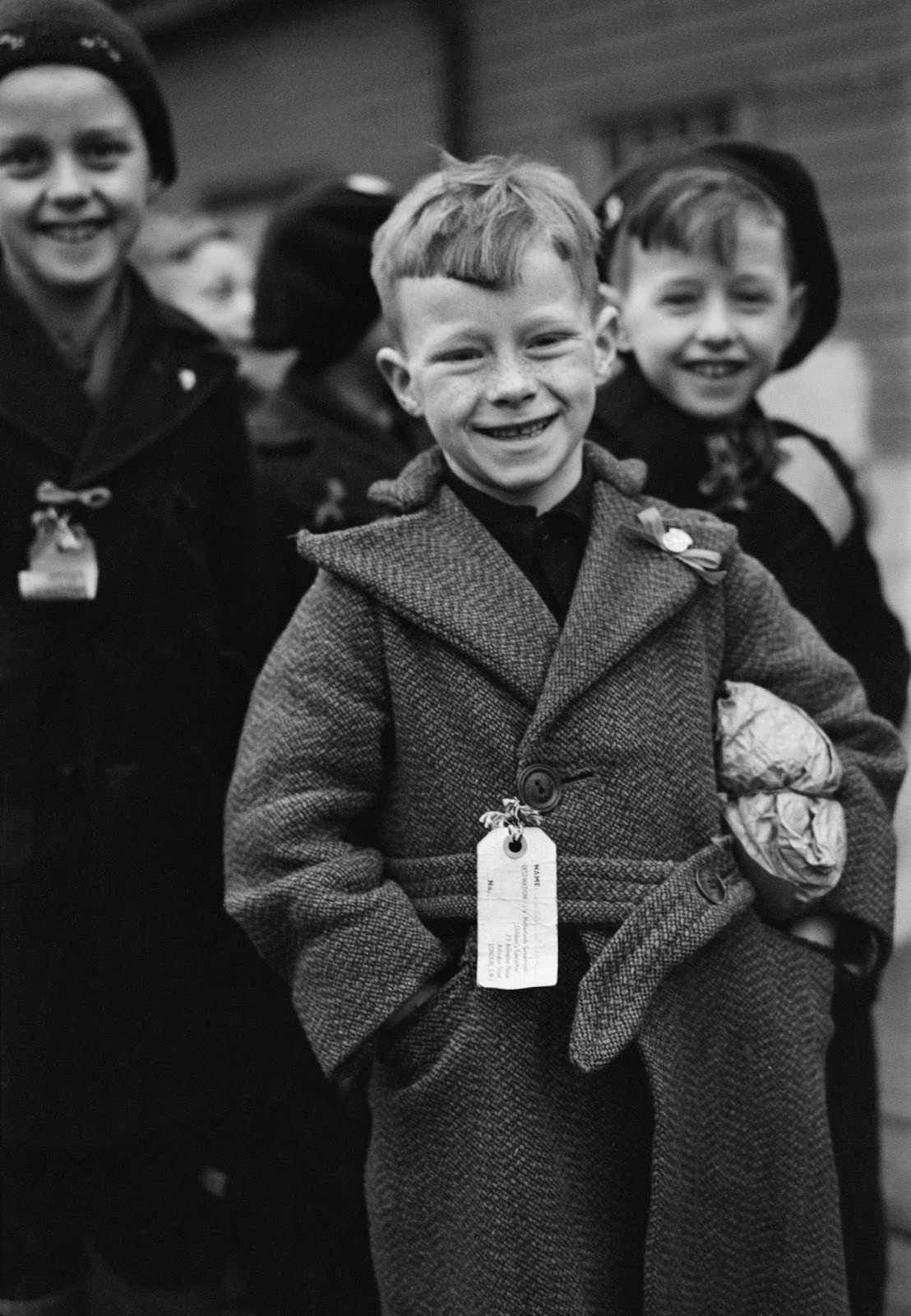 Dutch child refugees arrival In Britain at Tilbury, Essex, on Mar. 11, 1945. The small paper parcel under the boy's arm contains all his luggage.