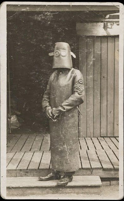Protective gear for a radiology nurse, circa 1918.