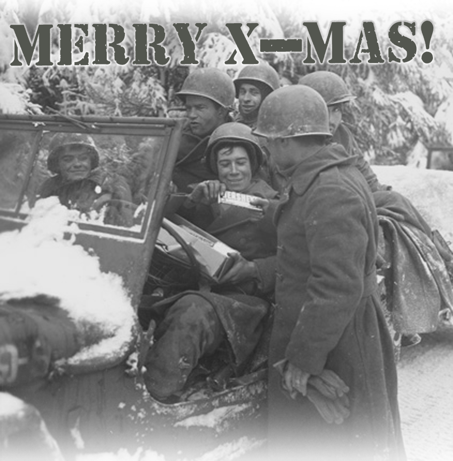 G.I. gets a belated Christmas gift, late due to the Battle of the Bulge. Belgium, January 1945.
