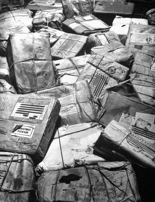 This is a sad memorial - In New York City, 1944, piles of Christmas packages meant for American Servicemen who have been listed as missing or killed in action build up and await a Return to Sender stamp.