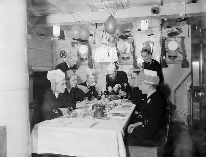 Christmas dinner celebrations on board HMS WESTMINSTER at Rosyth, December 1941.