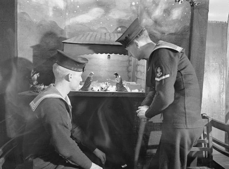 Home Fleet Christmas- Shipwrights Build Nativity Model For Ship's Chapel. 24 December 1942, on Board HMS Dunluce Castle, of the Home Fleet.