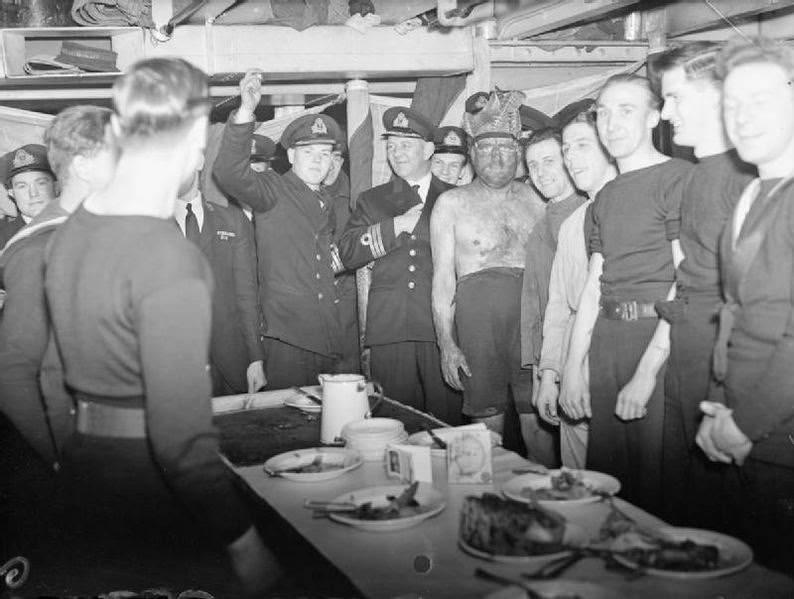 Leading Seaman Becomes Captain For Christmas Day Only. 25 December 1942, on Board HMS Dunluce Castle, of the Home Fleet. Leading Seaman V Mccann of Belfast Was Allowed To Impersonate the Captain during Inspection.