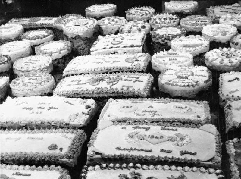 Some of the magnificent iced cakes made by the ship's cooks on board HMS KING GEORGE V at Christmas.