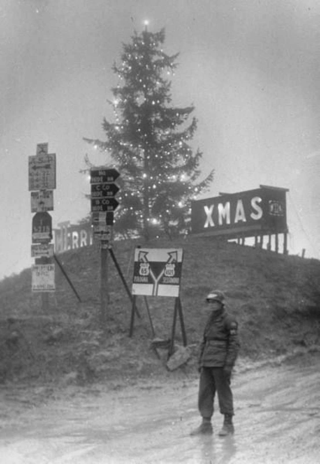 Christmas sign and tree at the Italian front, 1944.