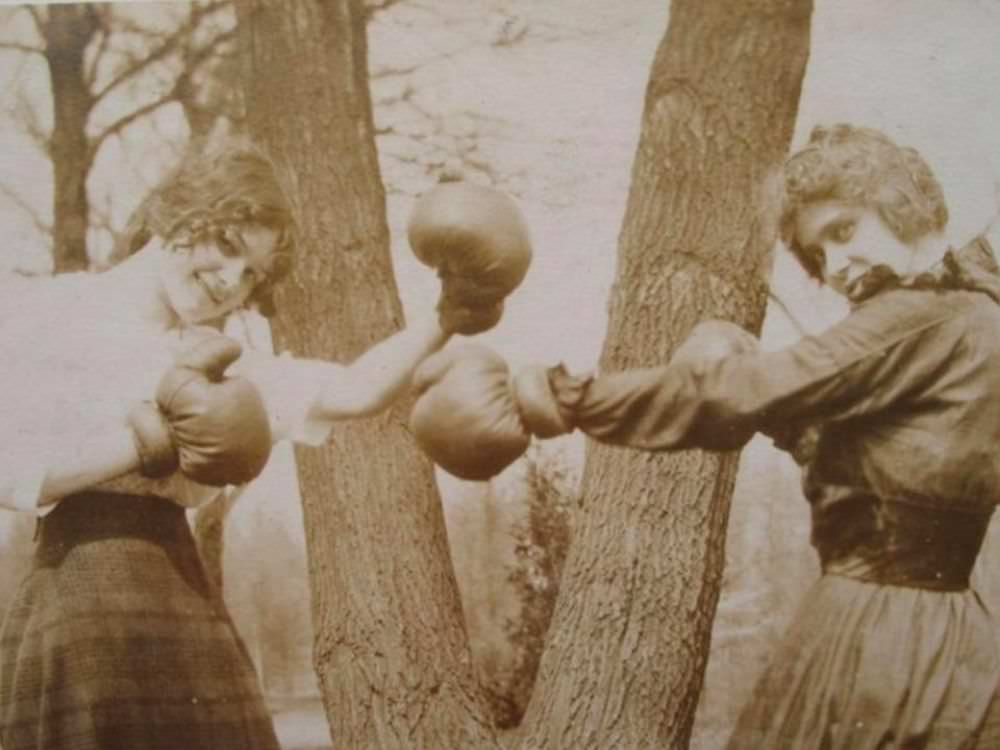 Two women box in an undisclosed location in the 1800s.