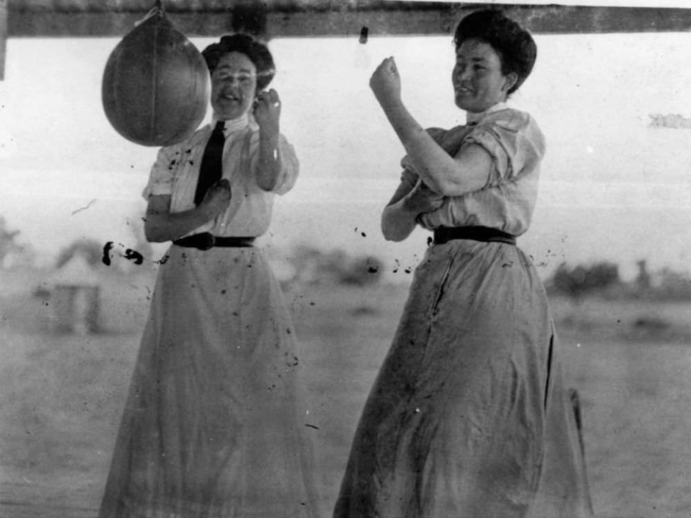 Sisters Booka and Chris Durack sparring with a speed bag, Australia, 1916.