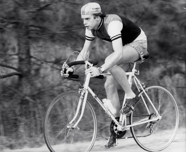 Shaun Cassidy riding a bike.