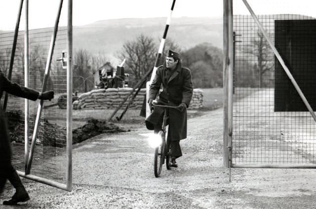 Richard Gere riding a bike.