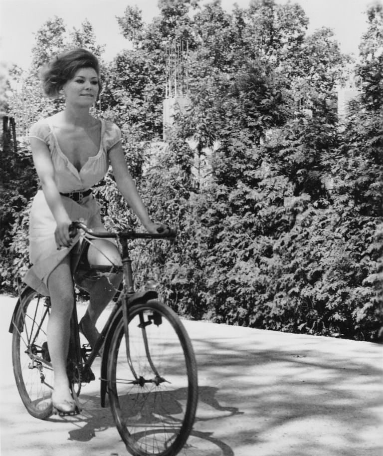 Irina Demick riding a bike.