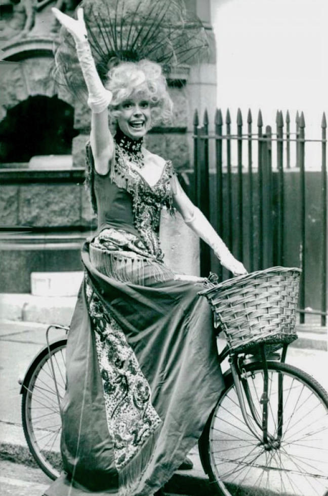 Carol Channing riding a bike