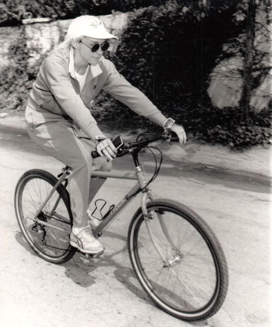 Madonna riding a bike.