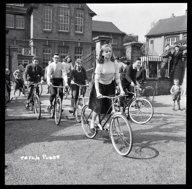 Carol White, Jacqueline Lewis and George Howell ride bikes