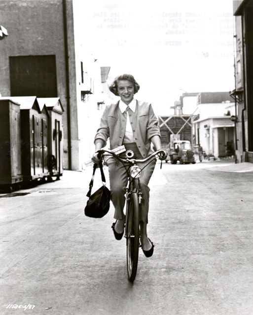 Rosemary Clooney riding a bike