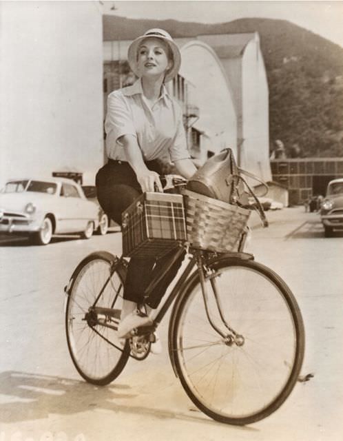 Venetia Stevenson riding a bike