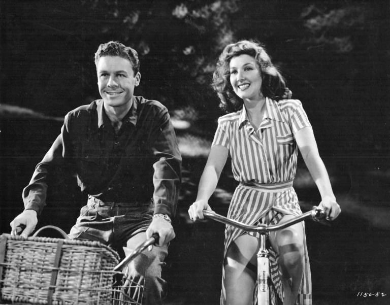 John Archer and Jean Parker on their bikes.
