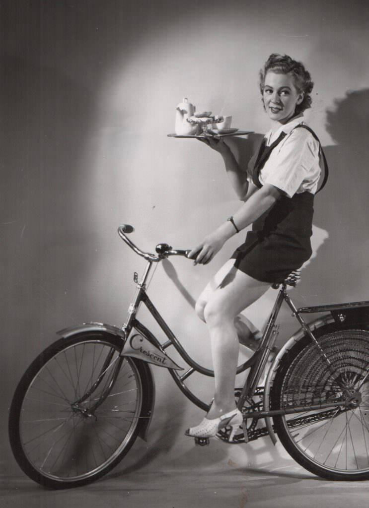 Jerry Colonna posing with his bike.