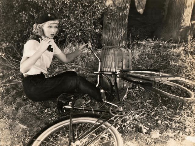 Joyce Compton falls from a bike.