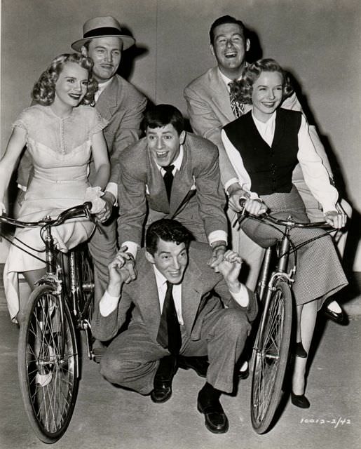 Marie Wilson, John Lund, Diana Lynn and Don DeFore ride bikes. Lewis rides Martin.