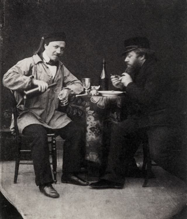 The first photograph of two people drinking and smoking, 1850