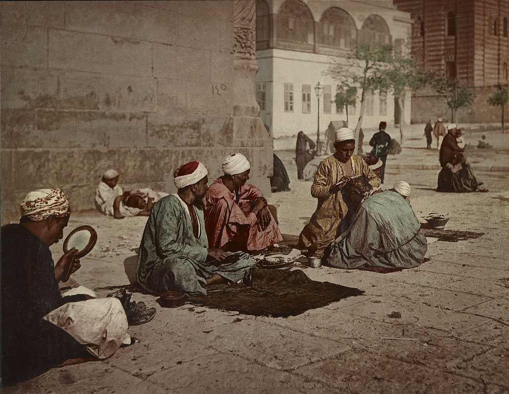 Arab hairdressers on the street, Cairo, 1890s